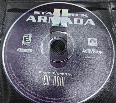 LOT 155: Multiple PC Games Including Star Trek Voyager Elite Force, Star Craft, and More