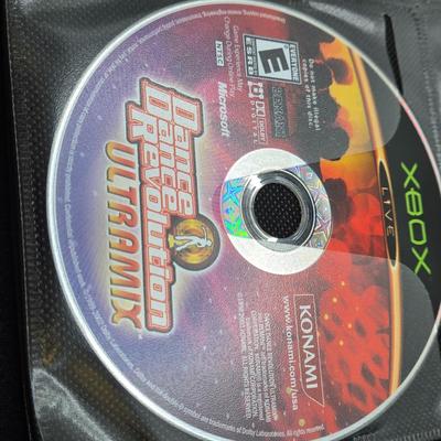 LOT 157: Large Variety of XBox Games Including The Sims, Legends of Wrestling II and More