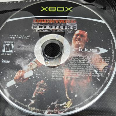 LOT 157: Large Variety of XBox Games Including The Sims, Legends of Wrestling II and More