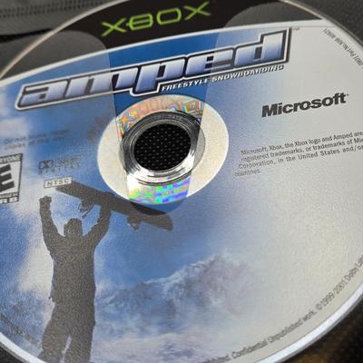 LOT 157: Large Variety of XBox Games Including The Sims, Legends of Wrestling II and More