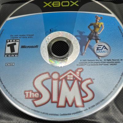 LOT 157: Large Variety of XBox Games Including The Sims, Legends of Wrestling II and More