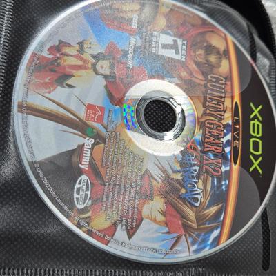 LOT 157: Large Variety of XBox Games Including The Sims, Legends of Wrestling II and More