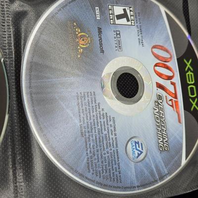 LOT 157: Large Variety of XBox Games Including The Sims, Legends of Wrestling II and More