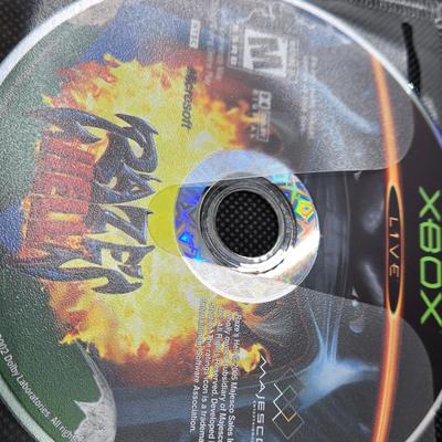 LOT 157: Large Variety of XBox Games Including The Sims, Legends of Wrestling II and More