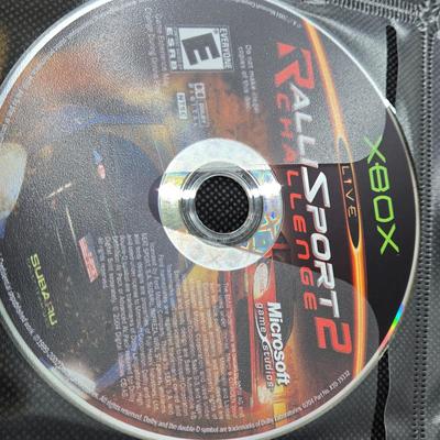 LOT 157: Large Variety of XBox Games Including The Sims, Legends of Wrestling II and More
