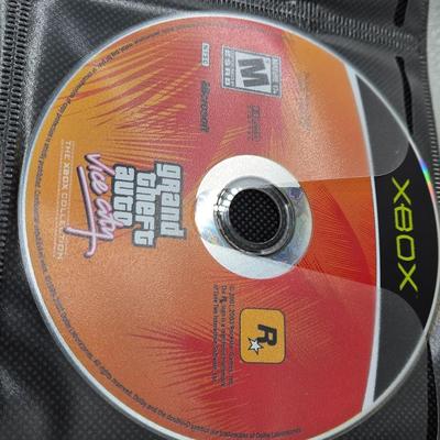 LOT 157: Large Variety of XBox Games Including The Sims, Legends of Wrestling II and More