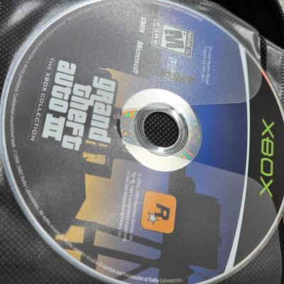 LOT 157: Large Variety of XBox Games Including The Sims, Legends of Wrestling II and More