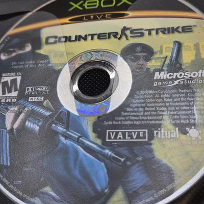 LOT 157: Large Variety of XBox Games Including The Sims, Legends of Wrestling II and More
