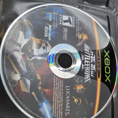 LOT 157: Large Variety of XBox Games Including The Sims, Legends of Wrestling II and More