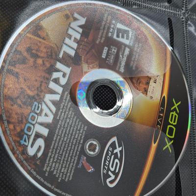 LOT 157: Large Variety of XBox Games Including The Sims, Legends of Wrestling II and More