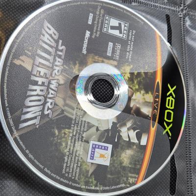 LOT 157: Large Variety of XBox Games Including The Sims, Legends of Wrestling II and More