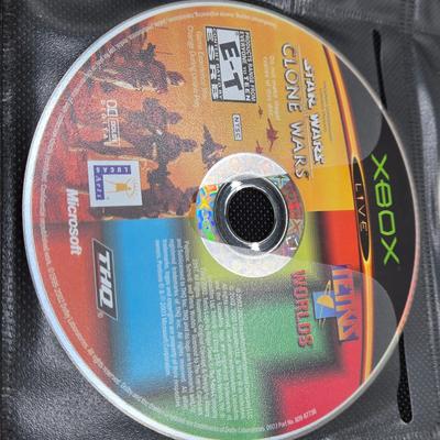 LOT 157: Large Variety of XBox Games Including The Sims, Legends of Wrestling II and More