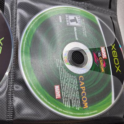 LOT 157: Large Variety of XBox Games Including The Sims, Legends of Wrestling II and More