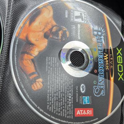 LOT 157: Large Variety of XBox Games Including The Sims, Legends of Wrestling II and More
