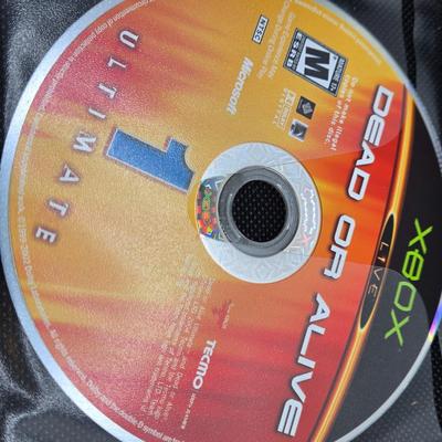 LOT 157: Large Variety of XBox Games Including The Sims, Legends of Wrestling II and More