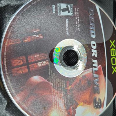 LOT 157: Large Variety of XBox Games Including The Sims, Legends of Wrestling II and More