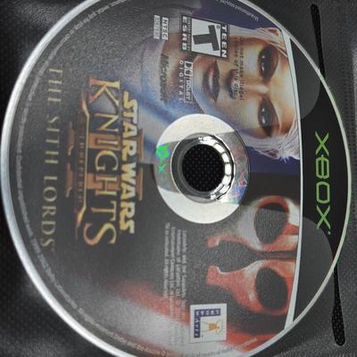 LOT 157: Large Variety of XBox Games Including The Sims, Legends of Wrestling II and More