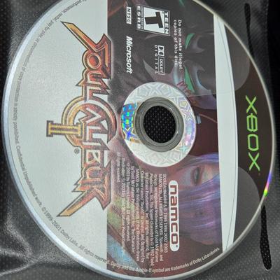 LOT 157: Large Variety of XBox Games Including The Sims, Legends of Wrestling II and More