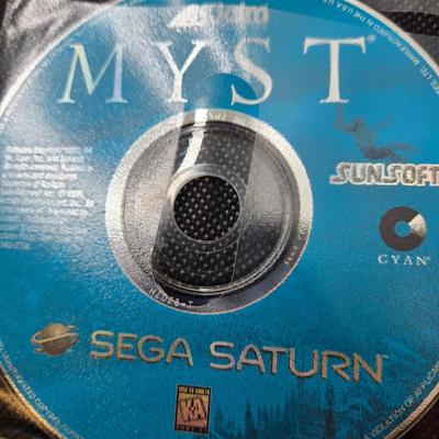 LOT 158: Multiple Sega Games Including Monaco Grand Prix, WWF Attitude, and More