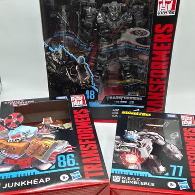 LOT 163: Transformers Studio Series Megatron, Junkheap, and N.E.S.T BumbleBee NIB