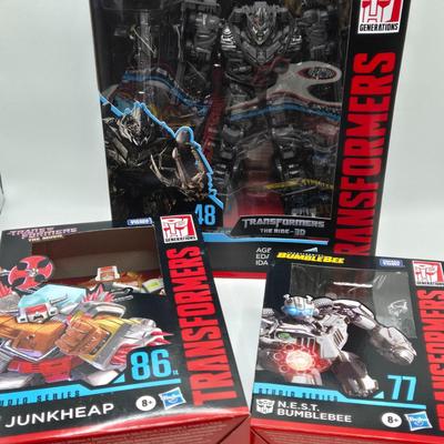 LOT 163: Transformers Studio Series Megatron, Junkheap, and N.E.S.T BumbleBee NIB