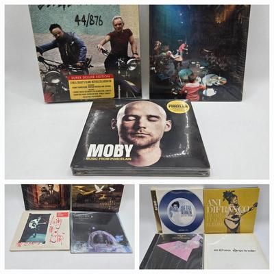 LOT 164: Music CDs of Multiple Genres Including Moby and Aretha Franklin