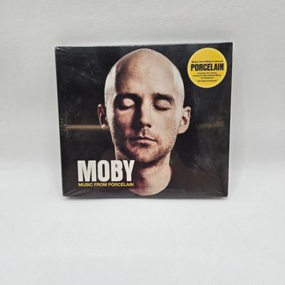 LOT 164: Music CDs of Multiple Genres Including Moby and Aretha Franklin