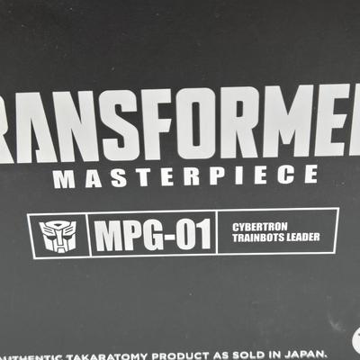 LOT 169: MPG-01 Transformers Masterpiece NIB