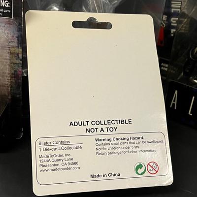 LOT 188: Assorted Collectibles, Toys - Mad Max, Aliens, and More