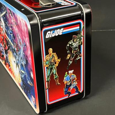 LOT 190: Big Lot of Transformers Toys and Collectibles, Top Gun Maverick, Funko GI Joe Crossover Lunchbox Set and More