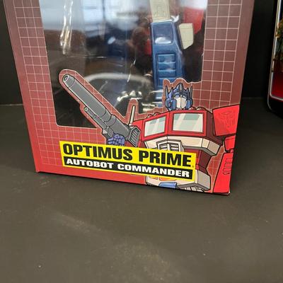 LOT 190: Big Lot of Transformers Toys and Collectibles, Top Gun Maverick, Funko GI Joe Crossover Lunchbox Set and More
