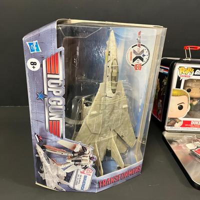 LOT 190: Big Lot of Transformers Toys and Collectibles, Top Gun Maverick, Funko GI Joe Crossover Lunchbox Set and More