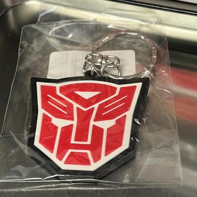 LOT 190: Big Lot of Transformers Toys and Collectibles, Top Gun Maverick, Funko GI Joe Crossover Lunchbox Set and More