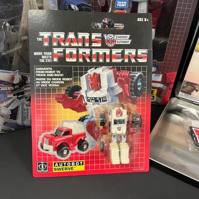 LOT 190: Big Lot of Transformers Toys and Collectibles, Top Gun Maverick, Funko GI Joe Crossover Lunchbox Set and More
