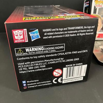 LOT 190: Big Lot of Transformers Toys and Collectibles, Top Gun Maverick, Funko GI Joe Crossover Lunchbox Set and More