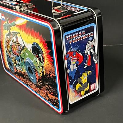 LOT 190: Big Lot of Transformers Toys and Collectibles, Top Gun Maverick, Funko GI Joe Crossover Lunchbox Set and More