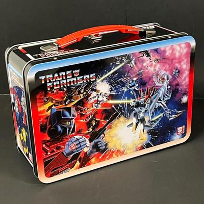 LOT 190: Big Lot of Transformers Toys and Collectibles, Top Gun Maverick, Funko GI Joe Crossover Lunchbox Set and More