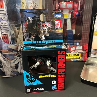 LOT 190: Big Lot of Transformers Toys and Collectibles, Top Gun Maverick, Funko GI Joe Crossover Lunchbox Set and More
