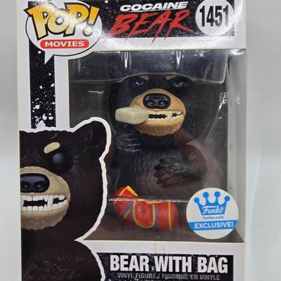 LOT 192: Variety of Funko Pops NIB Including Doc Holliday, Cocaine Bear, and The Crow