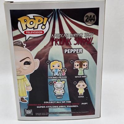 LOT 192: Variety of Funko Pops NIB Including Doc Holliday, Cocaine Bear, and The Crow