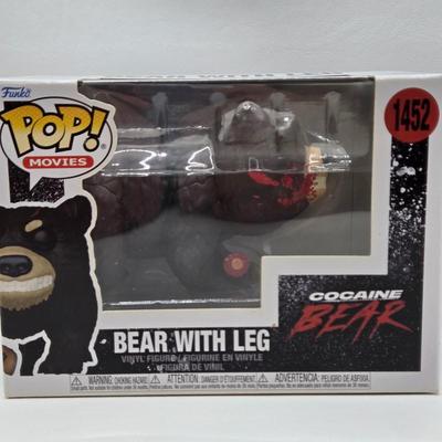LOT 192: Variety of Funko Pops NIB Including Doc Holliday, Cocaine Bear, and The Crow