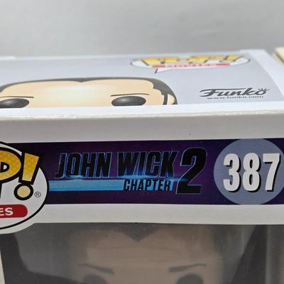 LOT 192: Variety of Funko Pops NIB Including Doc Holliday, Cocaine Bear, and The Crow