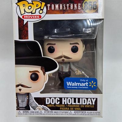 LOT 192: Variety of Funko Pops NIB Including Doc Holliday, Cocaine Bear, and The Crow