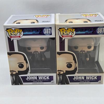 LOT 192: Variety of Funko Pops NIB Including Doc Holliday, Cocaine Bear, and The Crow