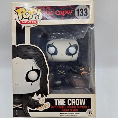LOT 192: Variety of Funko Pops NIB Including Doc Holliday, Cocaine Bear, and The Crow
