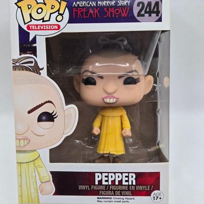 LOT 192: Variety of Funko Pops NIB Including Doc Holliday, Cocaine Bear, and The Crow