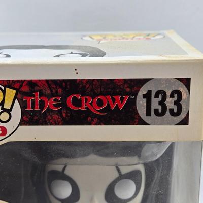 LOT 192: Variety of Funko Pops NIB Including Doc Holliday, Cocaine Bear, and The Crow