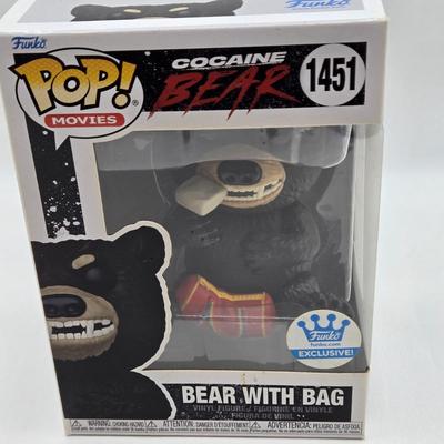 LOT 192: Variety of Funko Pops NIB Including Doc Holliday, Cocaine Bear, and The Crow