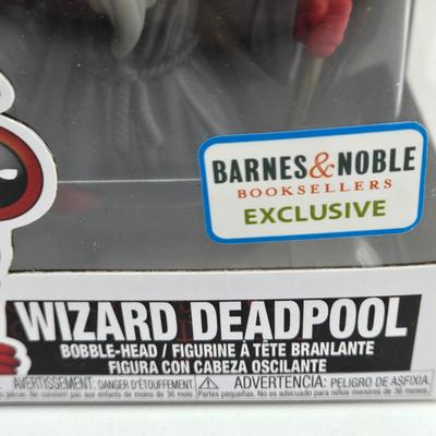 LOT 193: NIB Variety of Funko Pops Including Wizard Deadpool, Halo the Weapon, and Super Heroes Batgirl