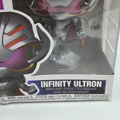 LOT 193: NIB Variety of Funko Pops Including Wizard Deadpool, Halo the Weapon, and Super Heroes Batgirl